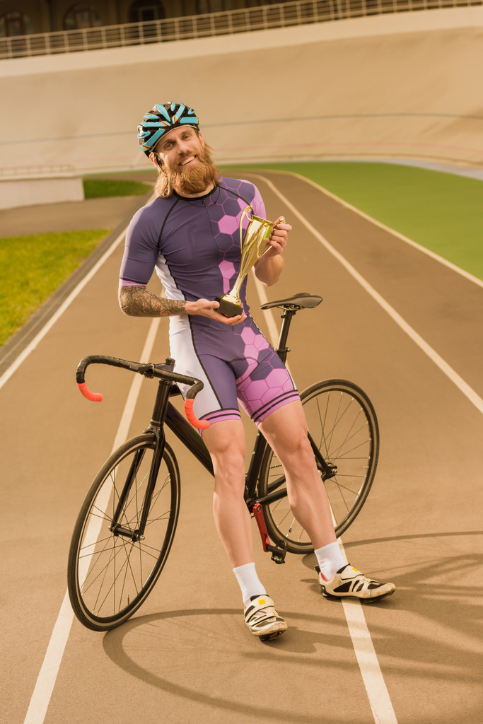 fietser met kampioen kop - Foto, afbeelding