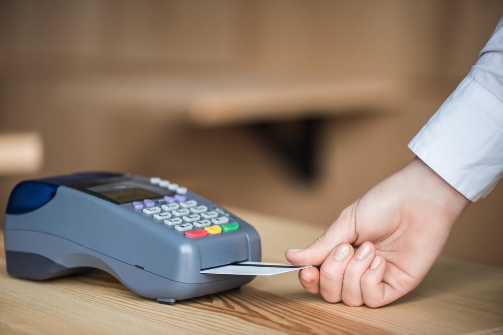 putting credit card into terminal - Photo, Image