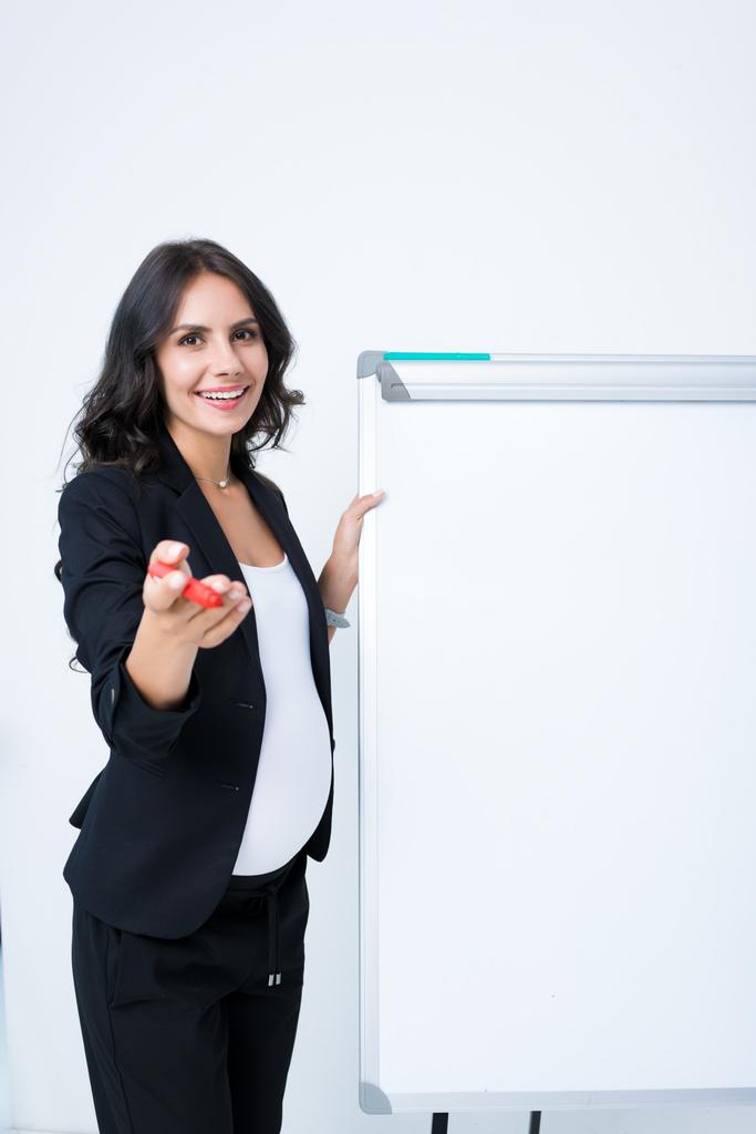 pregnant businesswoman with blank whiteboard - Photo, Image