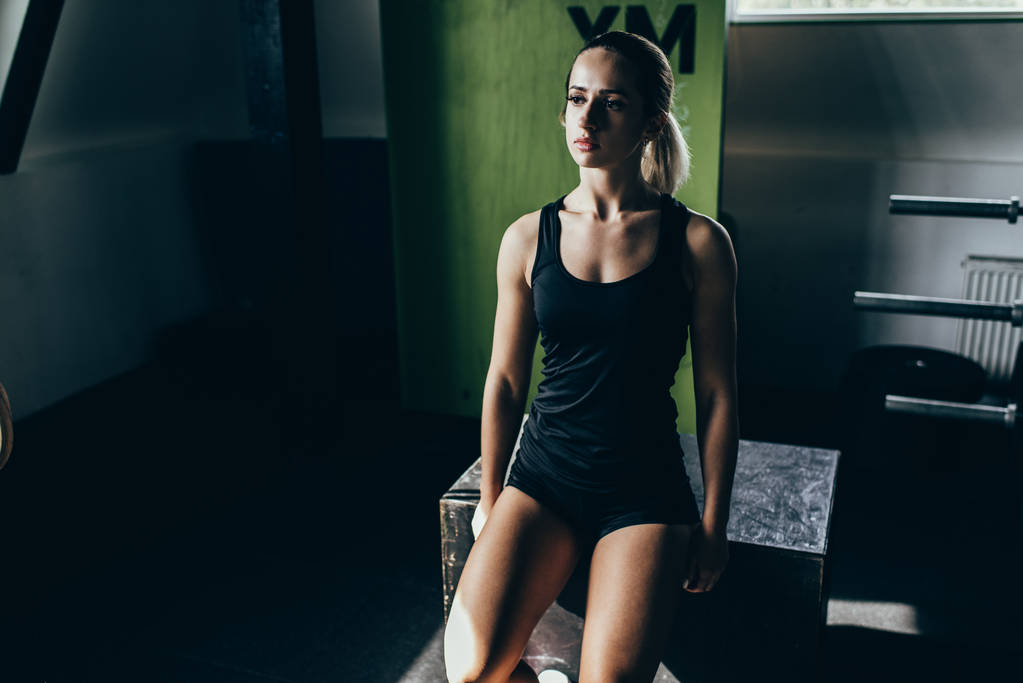 sportswoman on break in gym - Photo, Image