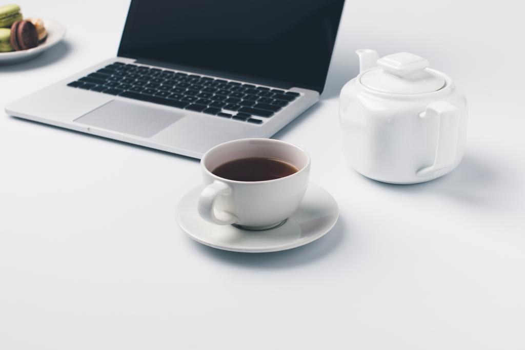 cup of tea and laptop - Photo, Image