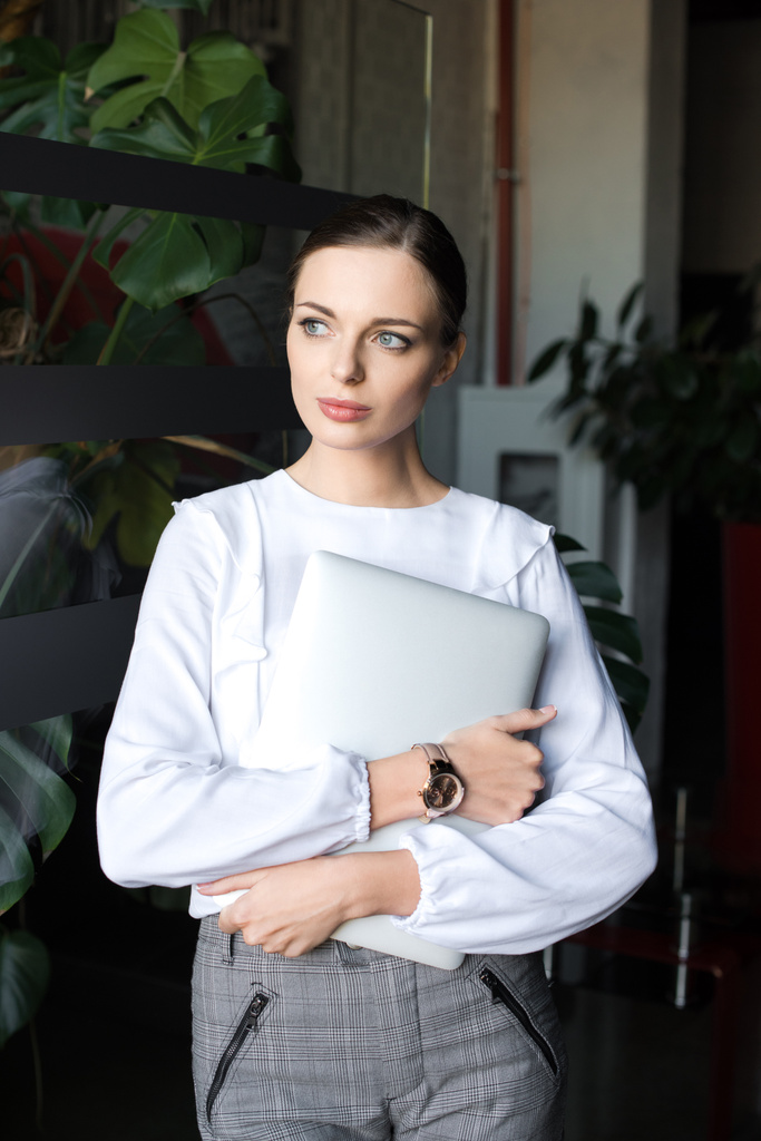 businesswoman holding laptop - Photo, Image