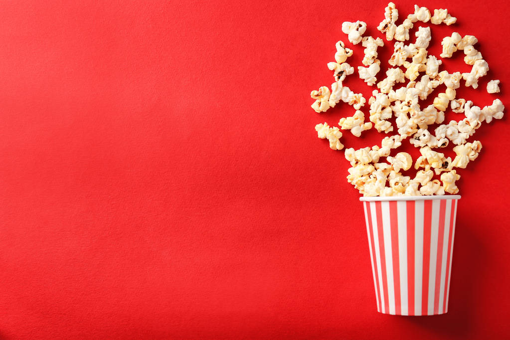 popcorn on color background - Photo, Image