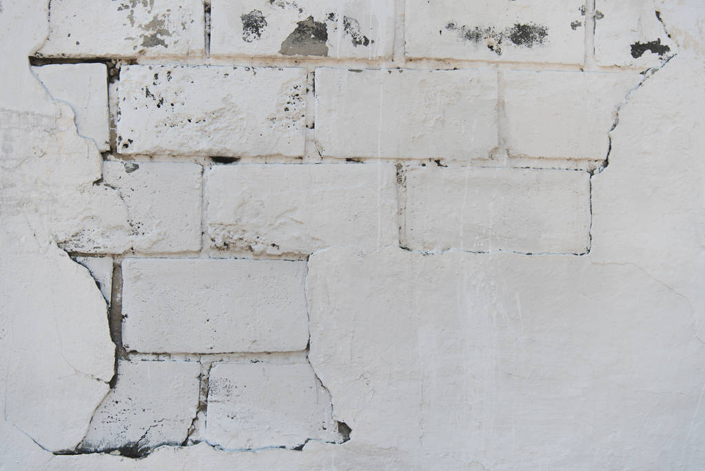 白い風化したレンガの壁のテクスチャのクローズ アップ ビュー ロイヤリティフリー写真 画像素材