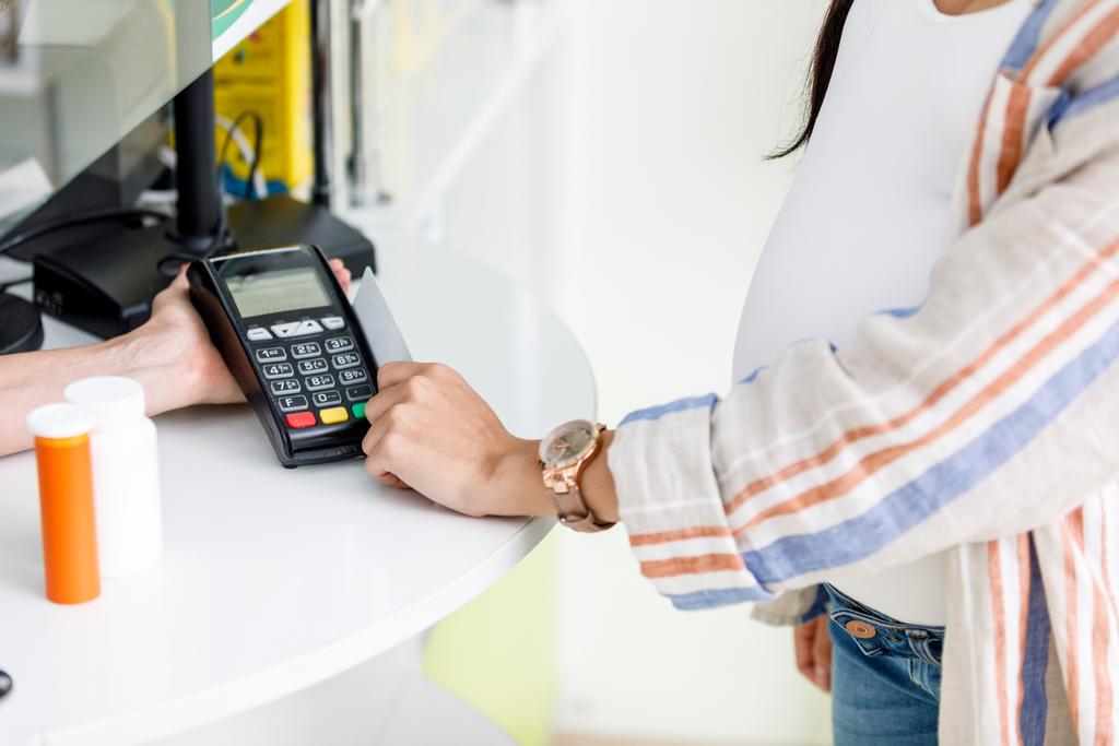 payment by credit card in drugstore - Photo, Image
