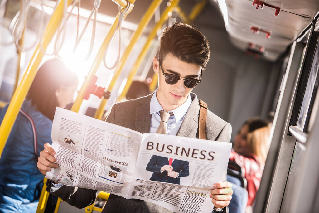 young businessman in bus - Photo, Image