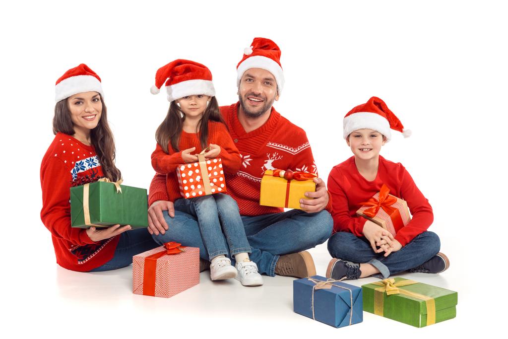 сім'я з різдвяними подарунками
 - Фото, зображення