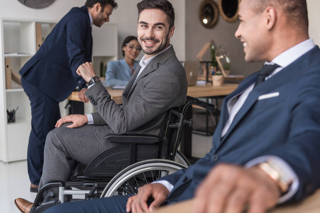 smiling disabled businessman in office - Photo, Image