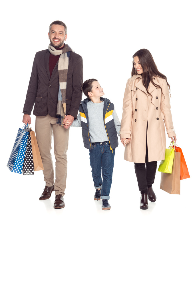 Eltern und Sohn mit Einkaufstüten - Foto, Bild