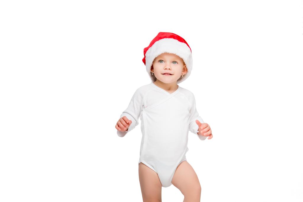 Bebé en sombrero de santa
 - Foto, Imagen