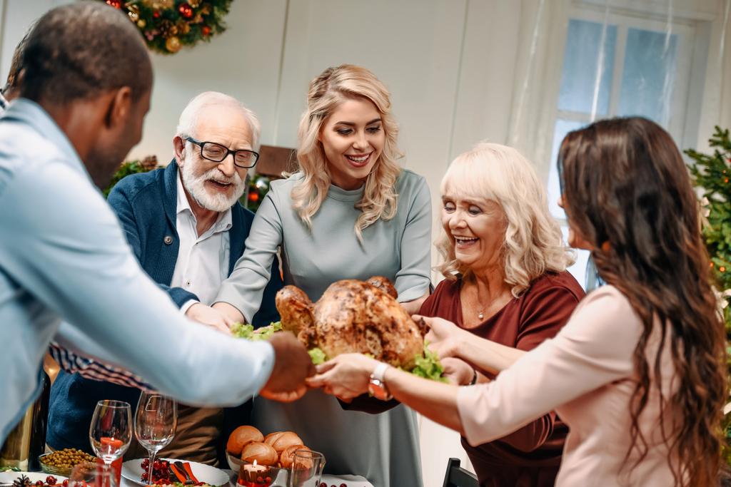 family holding christmas turkey - Photo, Image