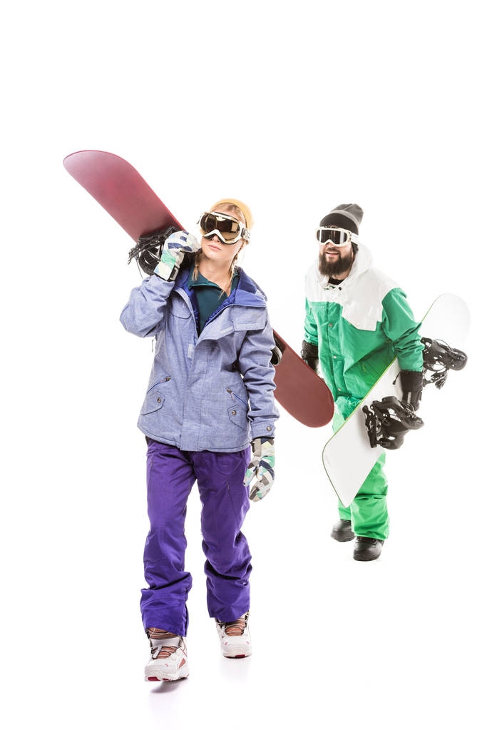 couple in snowboarding costumes with snowboards - Photo, Image
