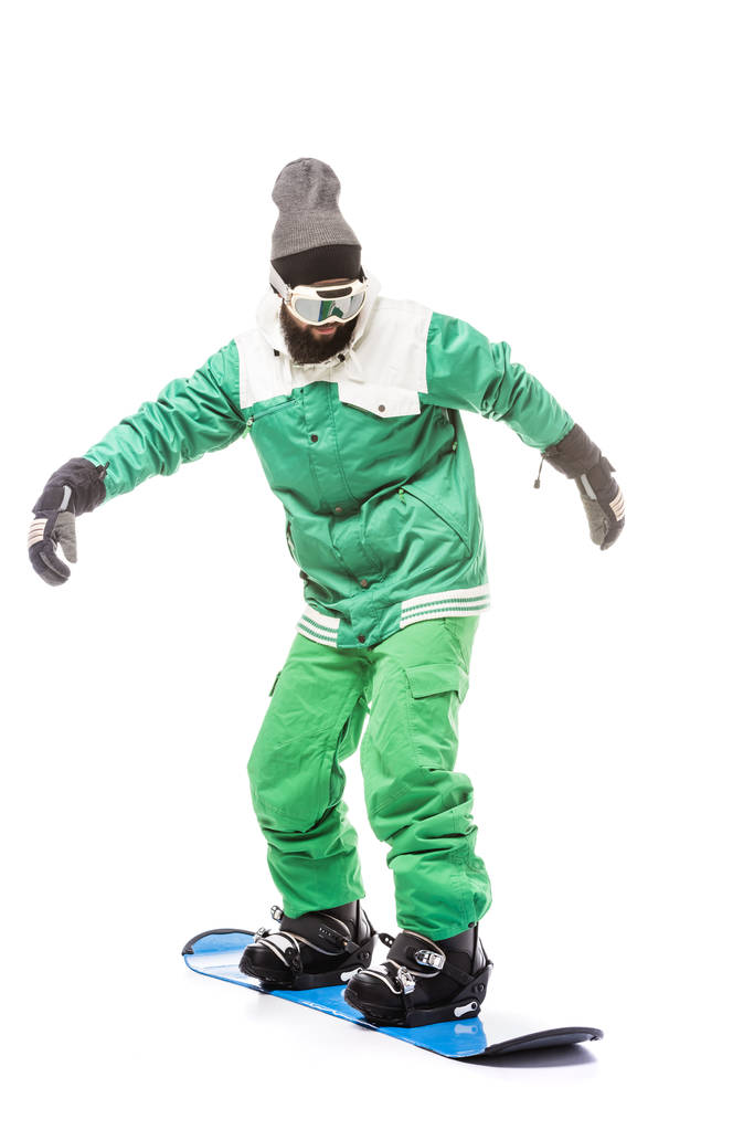 Hombre de pie sobre snowboard
 - Foto, imagen