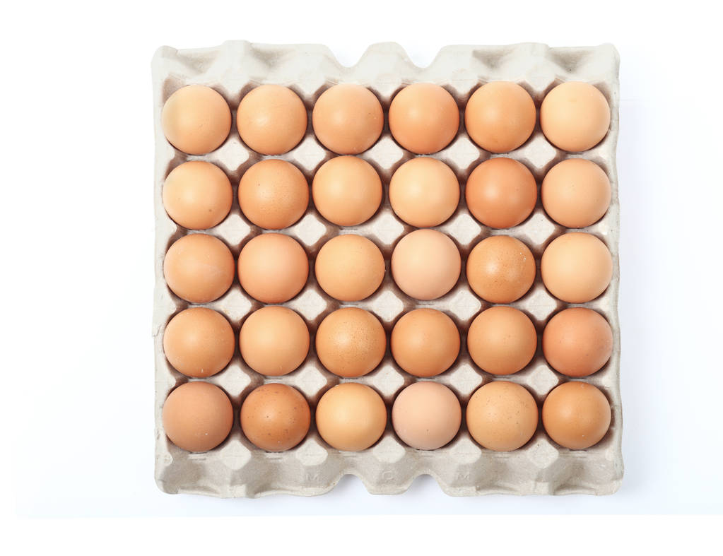 свіжі курячі яйця в лотку ізольовані відсічний контур
.  - Фото, зображення