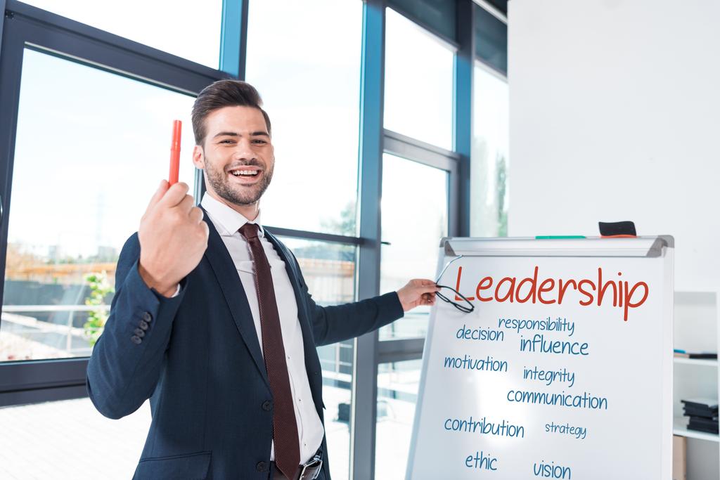 smiling businessman with whiteboard - Photo, Image