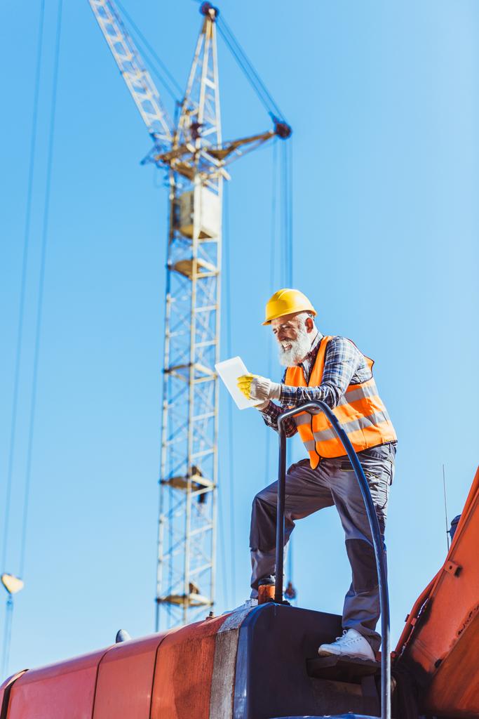 construction worker using digital tablet - Photo, Image