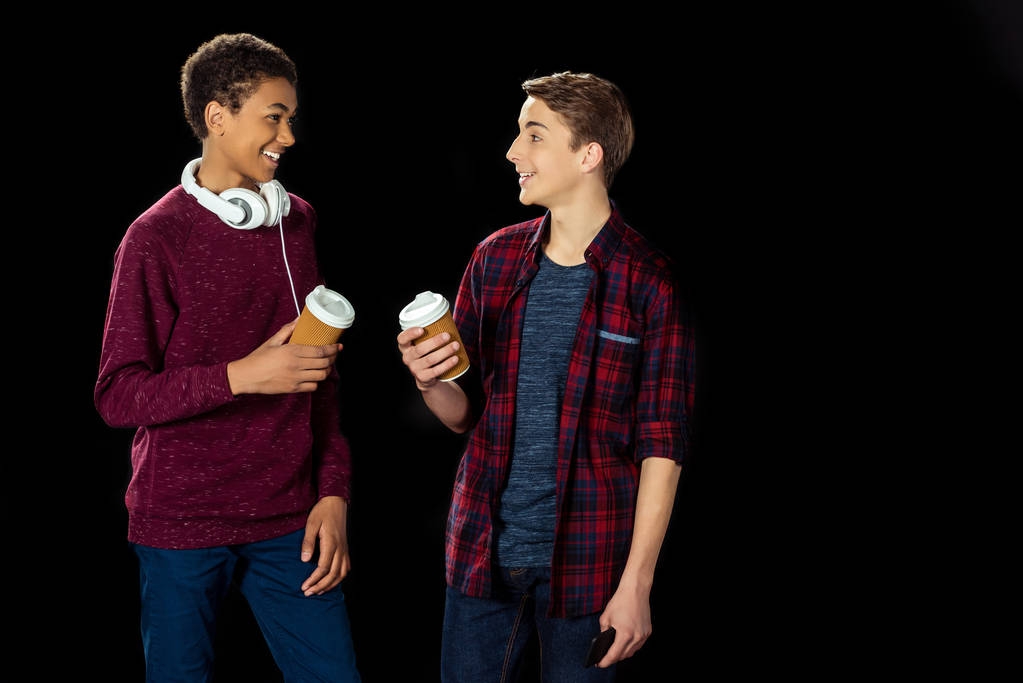 teen boys with paper cups of coffee - Photo, Image