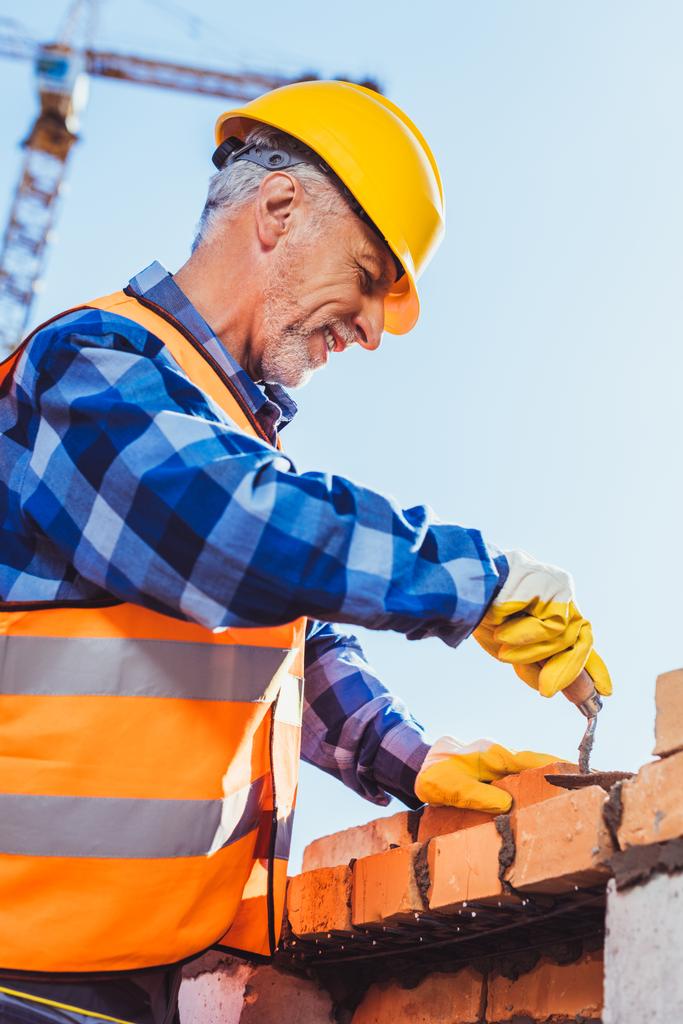 construction worker laying bricks - Photo, Image