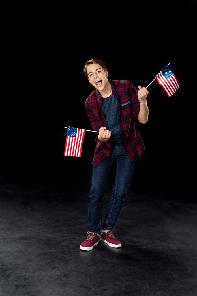 menino adolescente com bandeiras EUA
 - Foto, Imagem