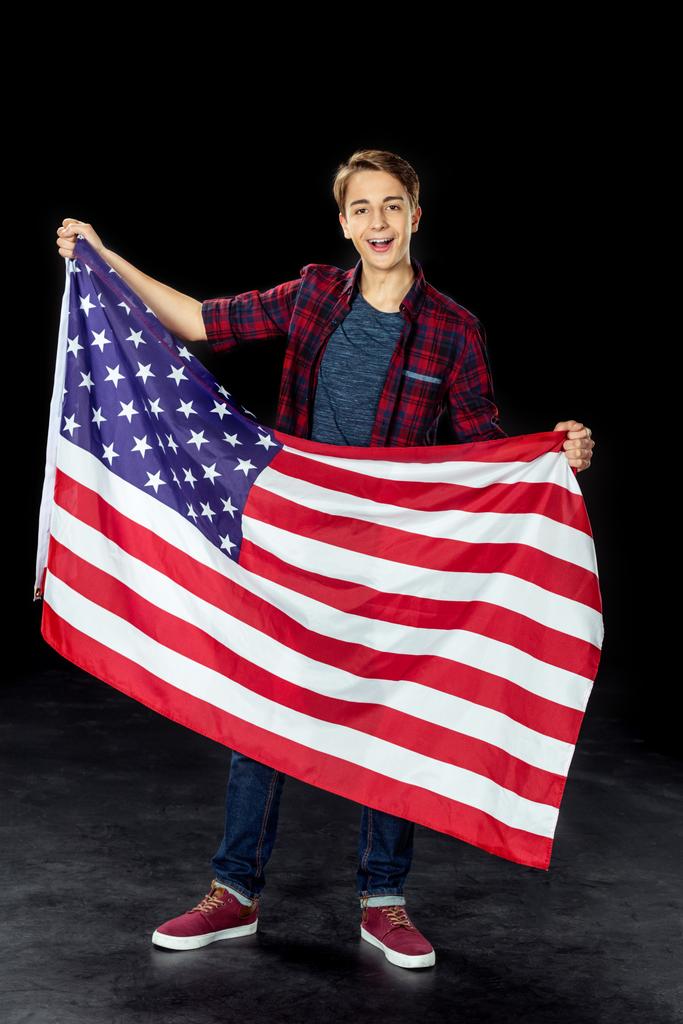adolescente chico con usa bandera
 - Foto, imagen