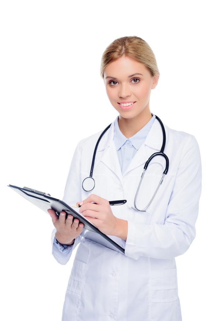female doctor writing diagnosis - Photo, Image