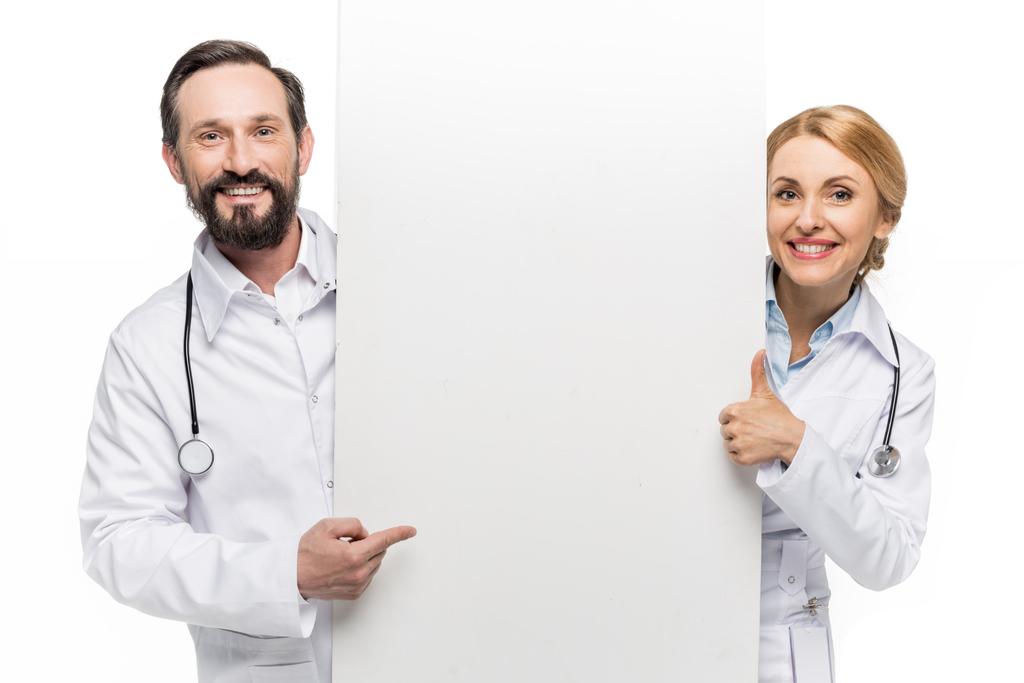 médicos segurando banner em branco
 - Foto, Imagem