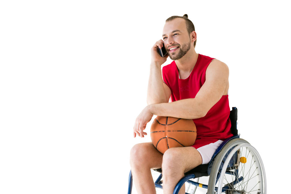 Deportista discapacitado hablando en smartphone
 - Foto, imagen