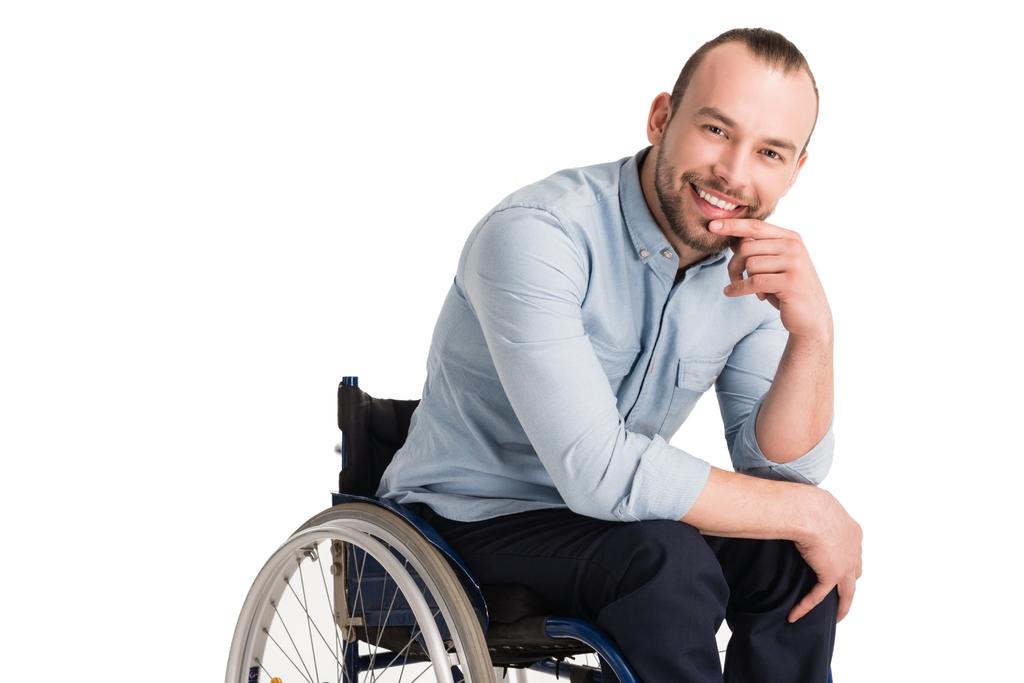 Усміхнений інвалід у інвалідному візку
 - Фото, зображення
