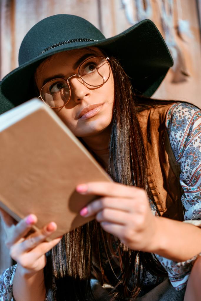 Hippie woman reading book - Photo, Image