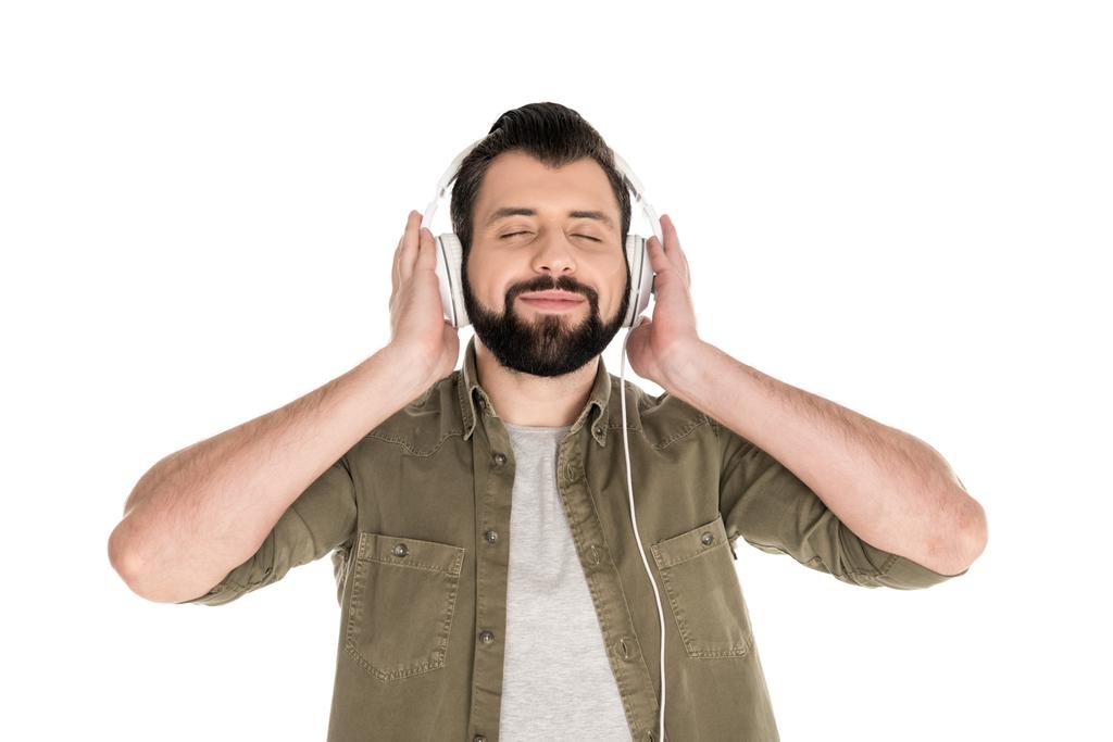 az ember hallgat zenét, csukott szemmel - Fotó, kép
