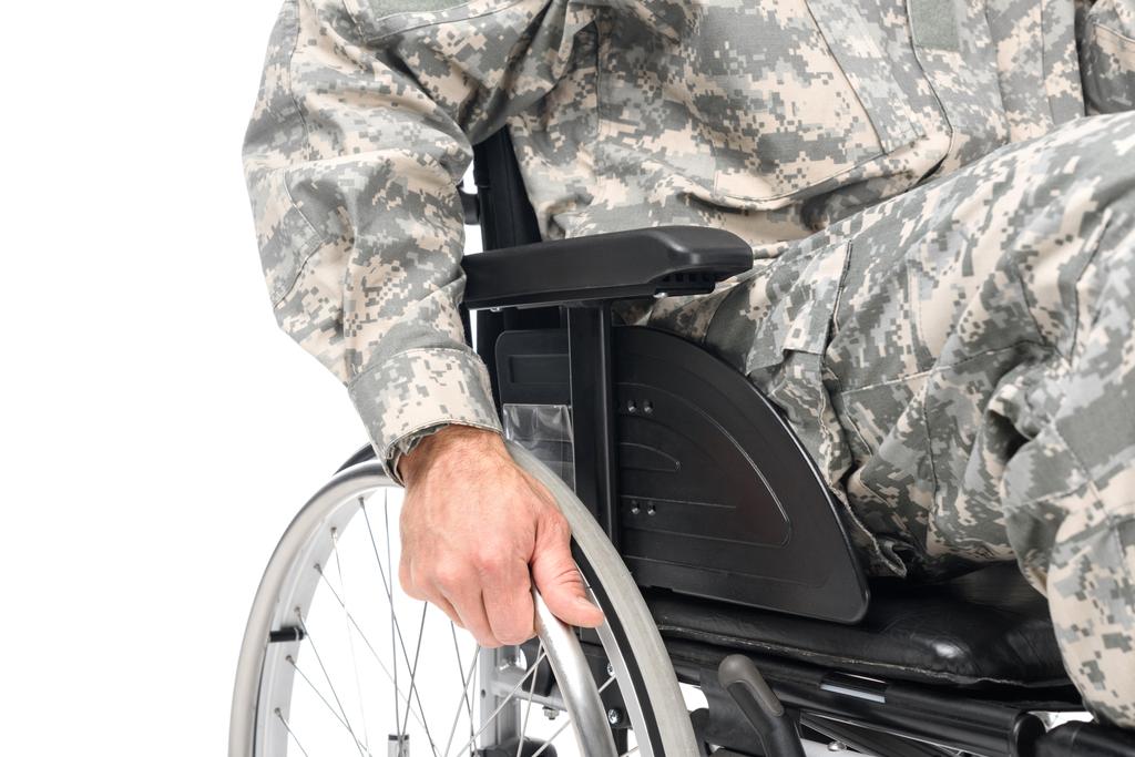 militar en silla de ruedas
 - Foto, Imagen