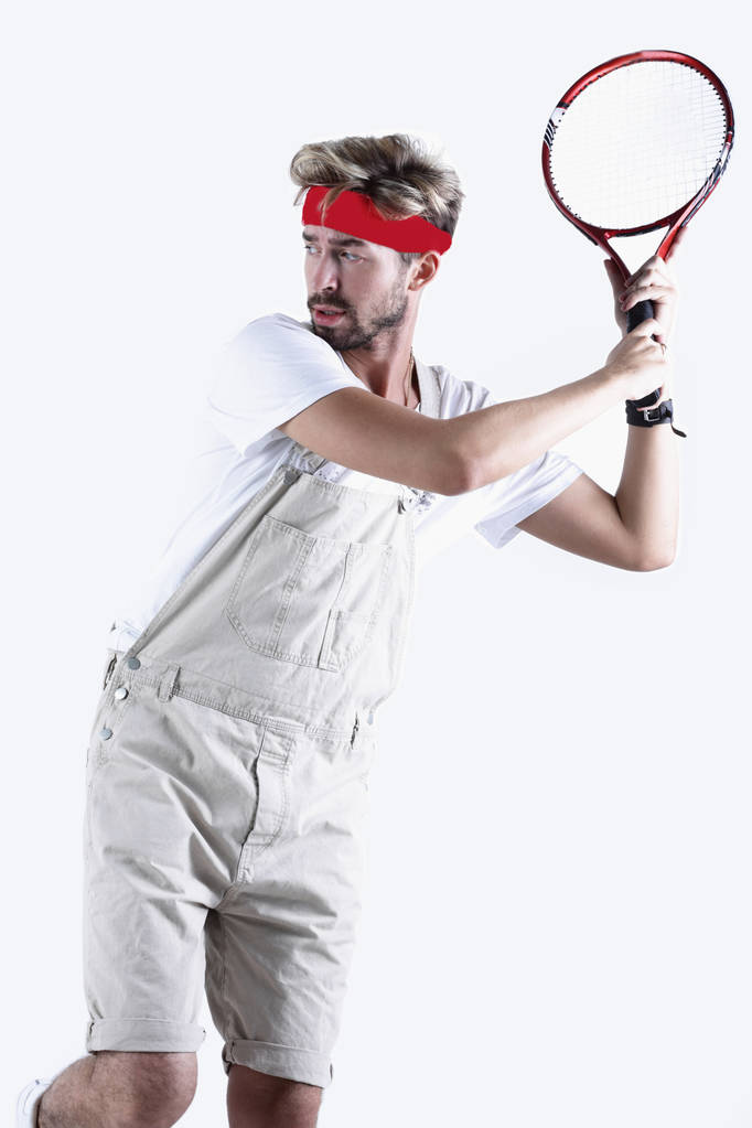 Male tennis player with racket in action. - Photo, Image