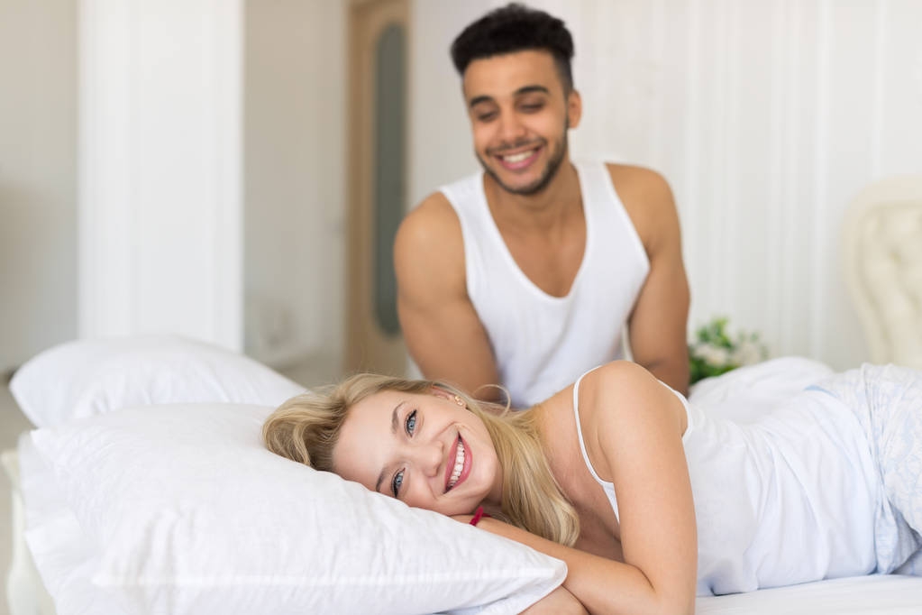 Young Couple Lying In Bed, Happy Smile Hispanic Man And Woman - Photo, Image