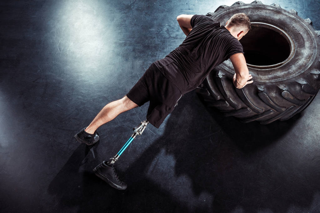 paralympialaiset urheilija tekee push ups
 - Valokuva, kuva