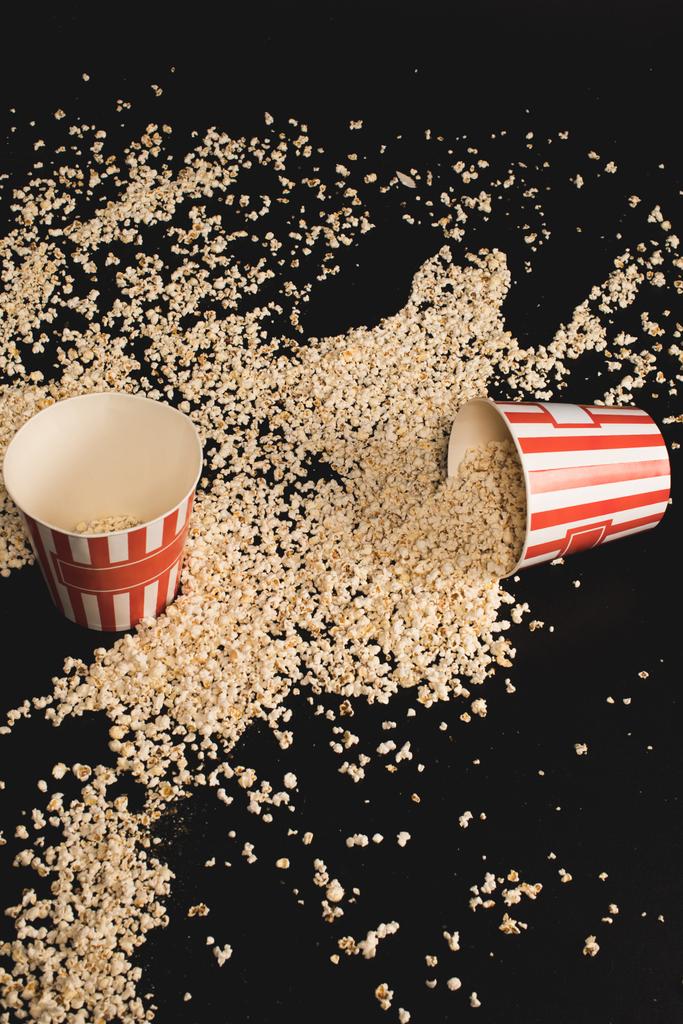 popcorn spilled of cardboard buckets - Photo, Image