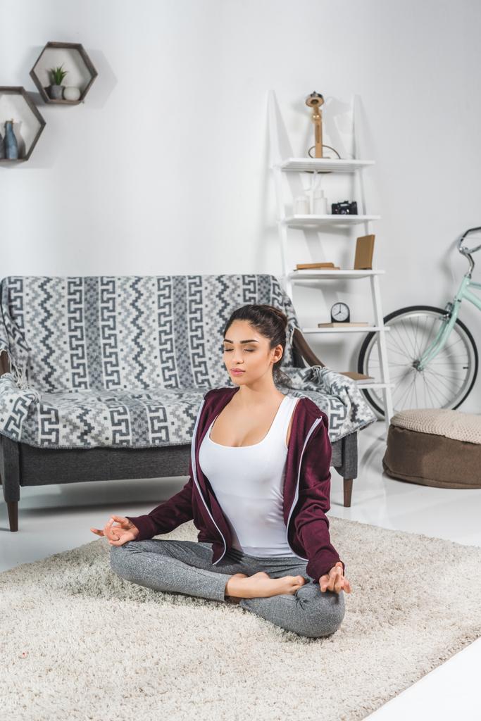 girl in yoga pose at home - Photo, Image