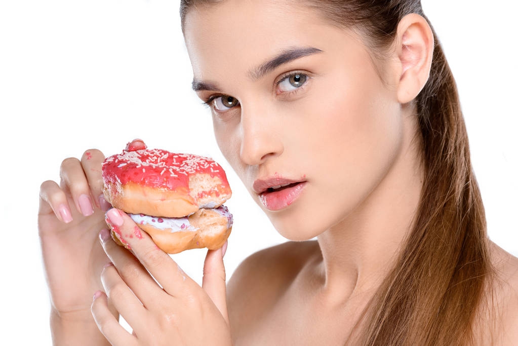 femme tenant donut
 - Photo, image