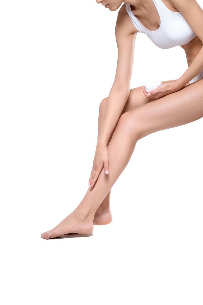  女性足にクリームを適用 - 写真・画像