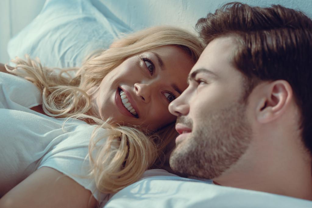 couple relaxing in bed at morning - Photo, Image