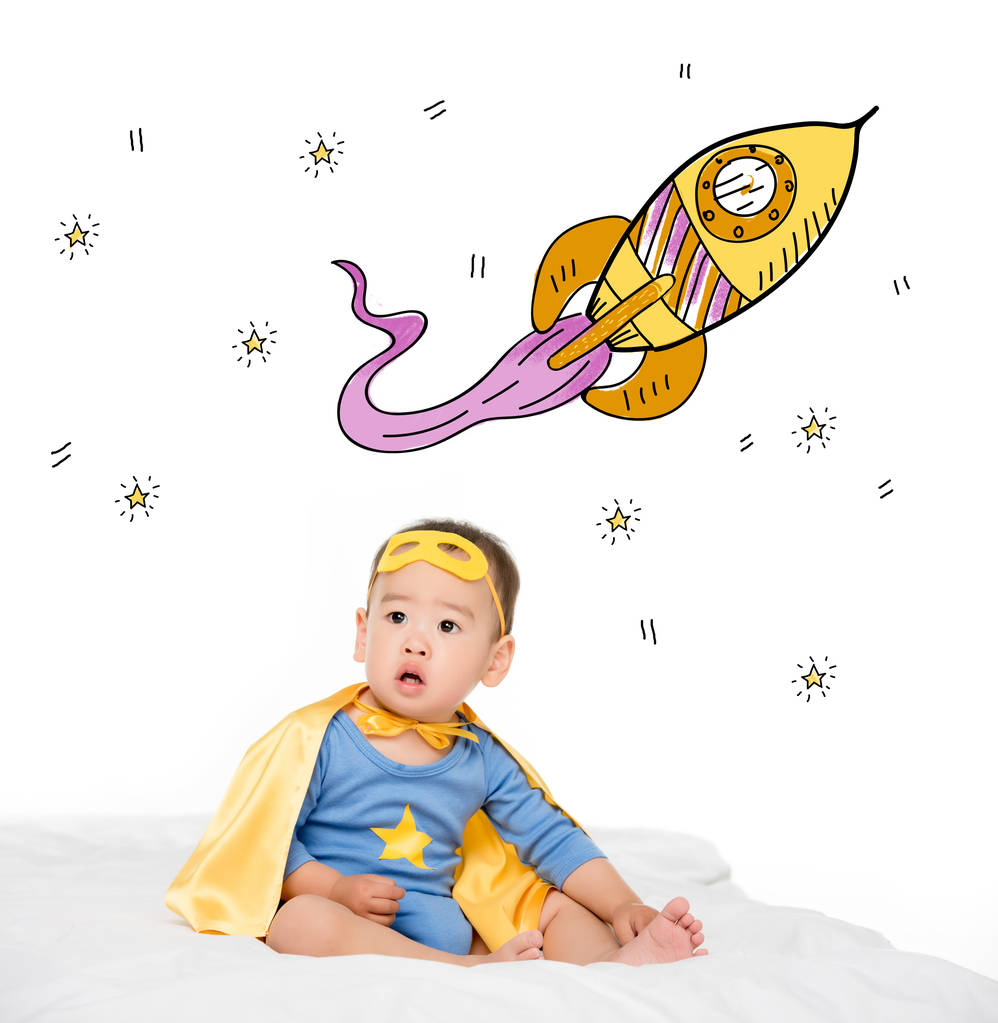 азіатський малюк у супергеройському мисі
 - Фото, зображення