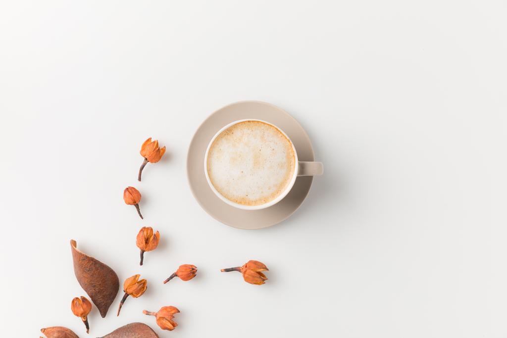 Taza de café con flores
 - Foto, imagen