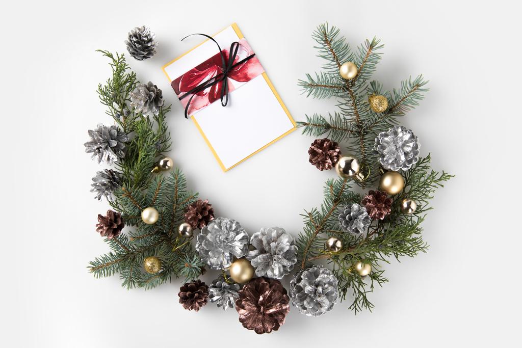 grinalda de Natal com cartão de saudação
 - Foto, Imagem