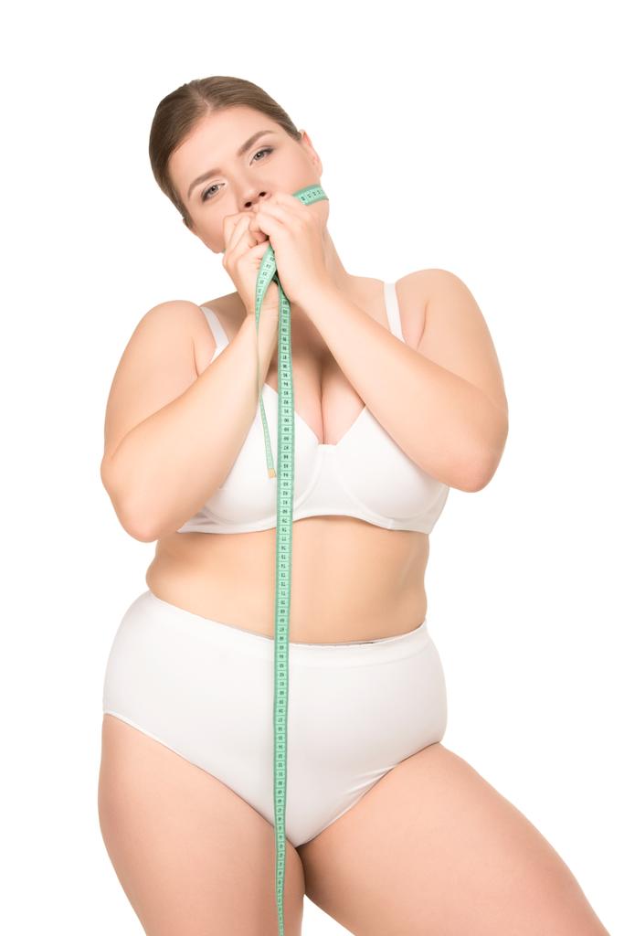 Donna grassa con metro a nastro
 - Foto, immagini