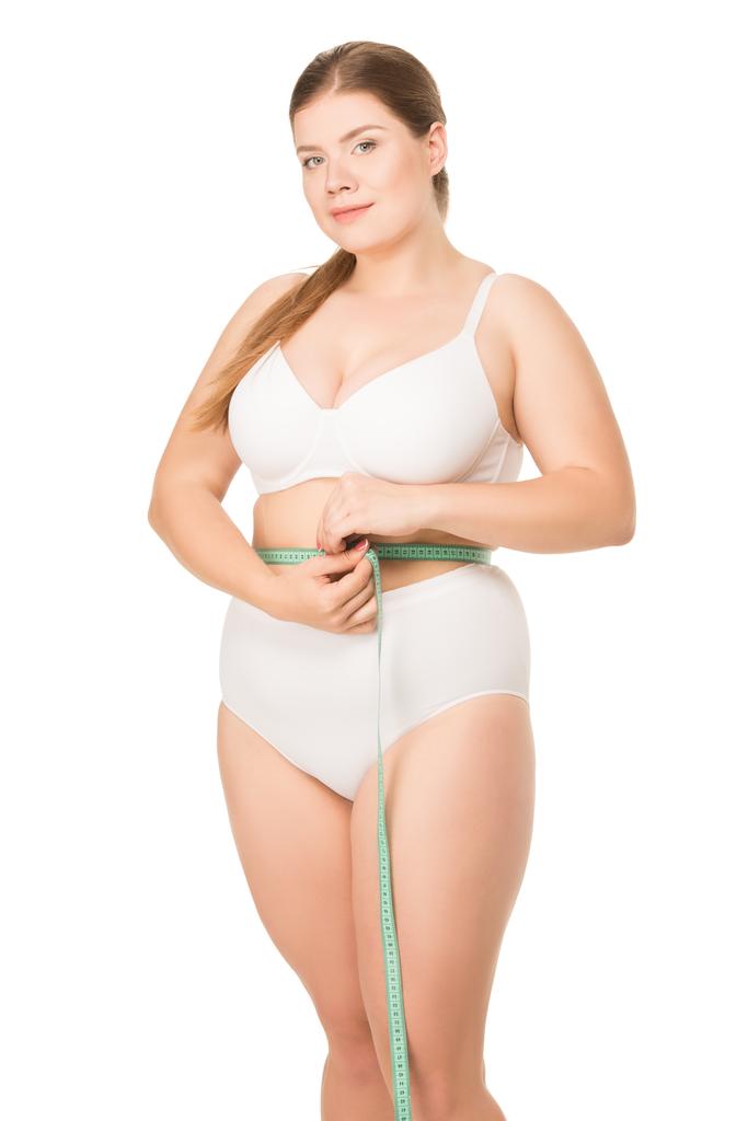 Надмірна вага жінки вимірювальна талія
 - Фото, зображення