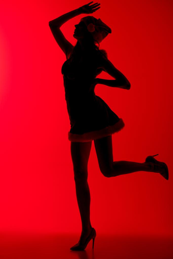 silhouet van sexy santa meisje - Foto, afbeelding