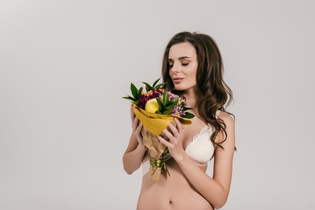 menina em lingerie segurando flores
 - Foto, Imagem