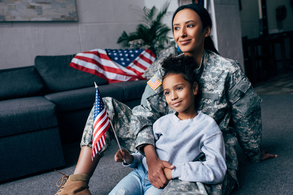 daughter and soldier with american flag - Photo, Image