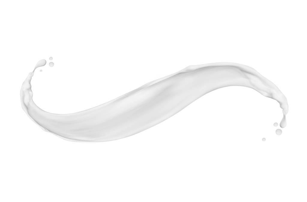 Salpicadura de leche o crema aislada sobre fondo blanco  - Foto, Imagen