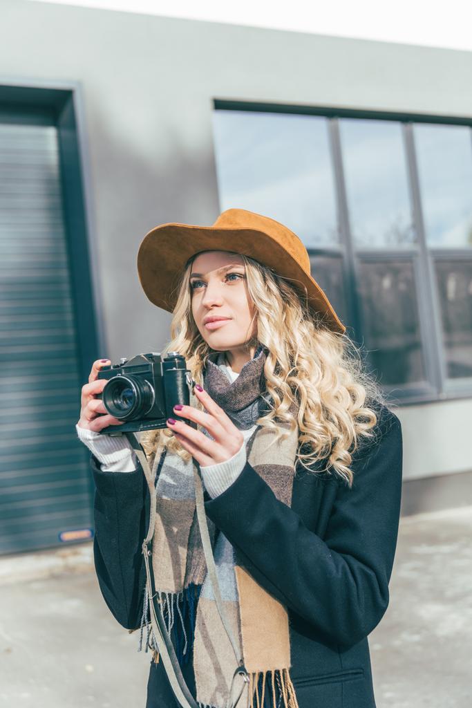 young woman with camera - Photo, Image