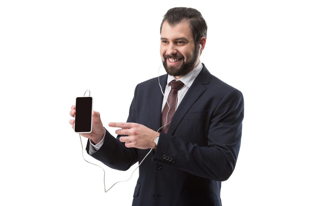 biznesmen, wskazując na smartphone - Zdjęcie, obraz